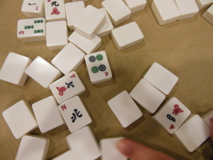 Mah Jongg tiles. Like cards, they come in suits: bams, craks, dots, winds and dragons.